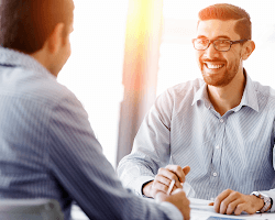 manager having a one-on-one conversation with an employee