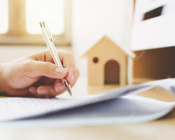 person signing a loan document