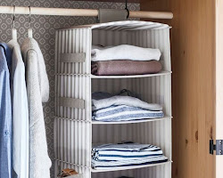 Hanging organizer that keeps clothes and accessories organized.