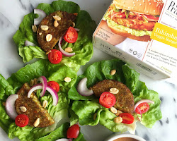 Lettuce-wrapped burger with vegetables