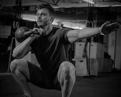 Person writing down their fitness goals