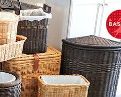 basket repurposed as a laundry hamper.
