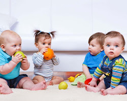 infant playing with toys