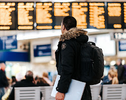 person looking at a job posting in another country