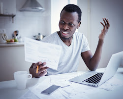 person looking confused by medical bills