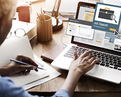 person searching for jobs online