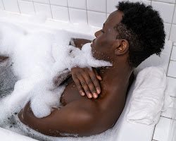 person taking a bubble bath