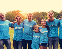 person volunteering in their new community